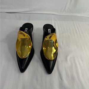 Jil Sander Black Mules with Gold Accent. Sold out.